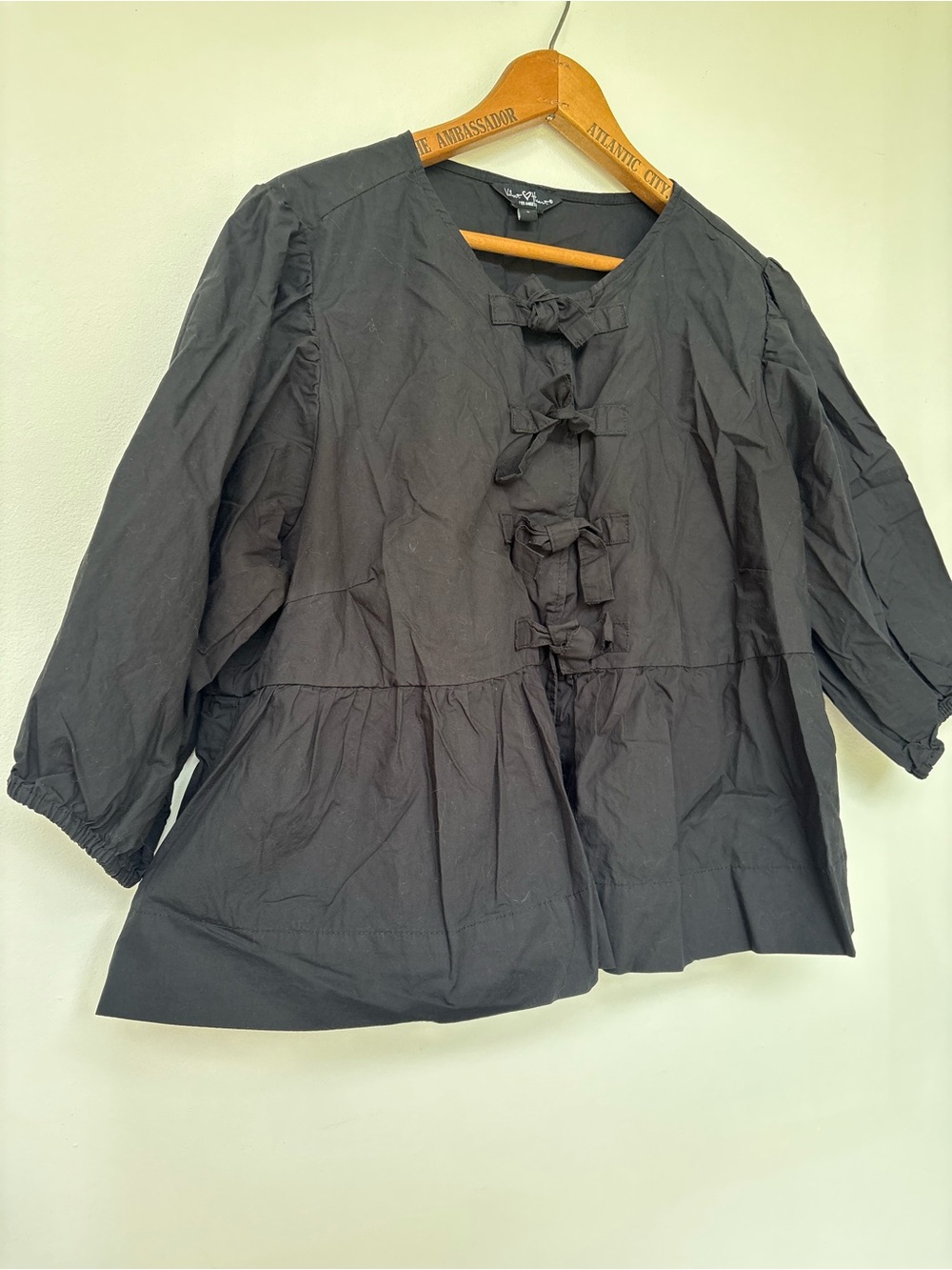 Black Bow-Front Peplum Blouse